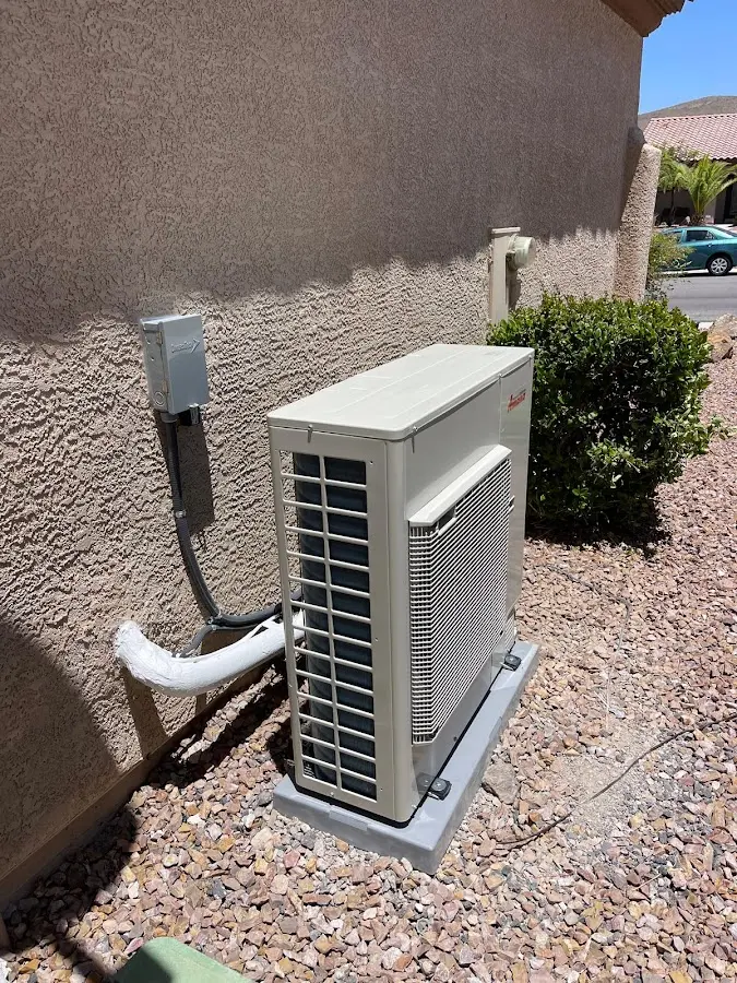Residential air conditioning condenser unit in Navasota